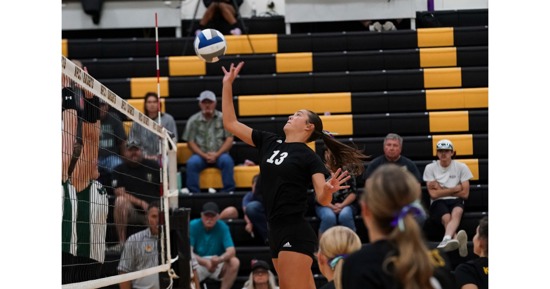 Jocelyn Cheek attacks the Raiders block in the third set of their matchup on Thursday night. (Daniel Stinman, North Platte Community College